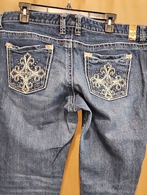Embellished Blue Women's Jeans with Ornate Back Pockets